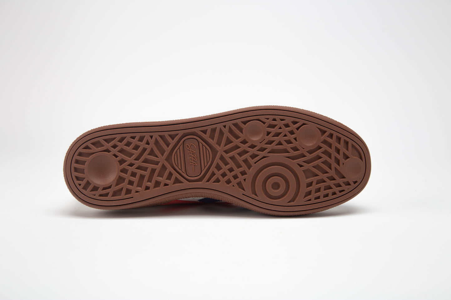 SA77A 颯合Brown shoe sole with textured pattern on a white background