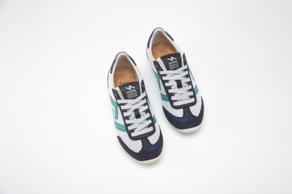 SA77A颯合 CATHAY HONG KONG BAY The brand that spells H with double seven. Sa77a Sustainable sneaker one pair of blue and white sneakers on a white background. 