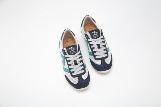 SA77A颯合 CATHAY HONG KONG BAY The brand that spells H with double seven. Sa77a Sustainable sneaker one pair of blue and white sneakers on a white background. 