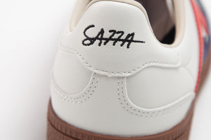 SA77A 颯合White sneaker with 'SA77A' embroidery on a white background