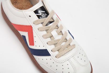 SA77A 颯合White sneaker with red and blue accents on a white background