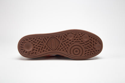 SA77A 颯合Brown shoe sole with textured pattern on a white background